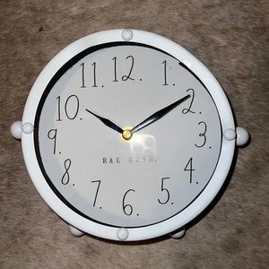 White Rae Dunn clock to sit on table